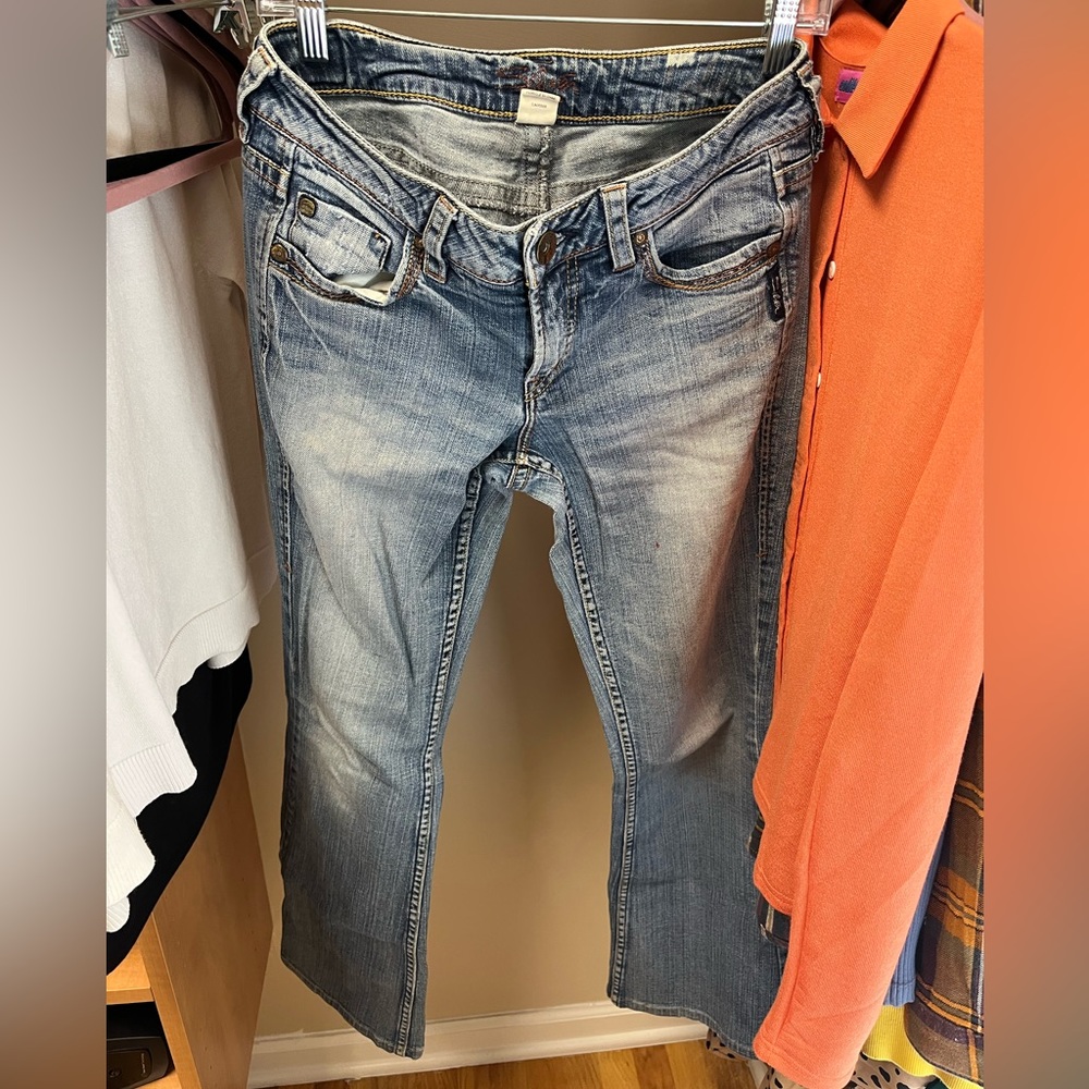 silver low rise bootcut jeans